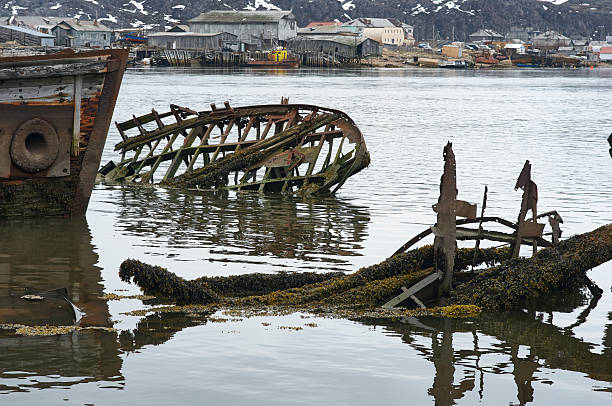 Old wrecked rusty ships near northern shore in Teriberka, Murmansk region