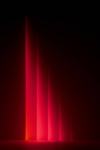 Abstract background in red tones with defocused bokeh light and dynamic glowing lines.