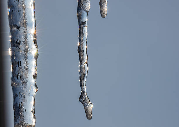 Beautiful icicles melt in the sun's rays
