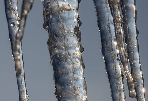 Beautiful icicles melt in the sun's rays