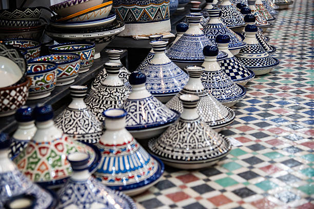 Colorful Moroccan Tagines Displayed on a Mosaic Floor