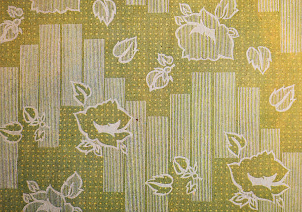 Old wallpaper on the wall. Old wallpaper for texture or background.