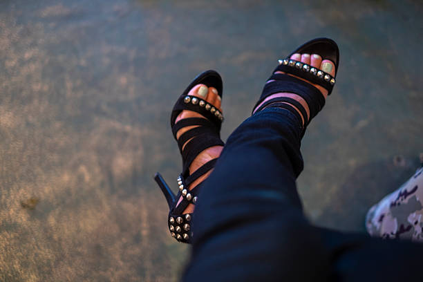 A woman's feet in heels.