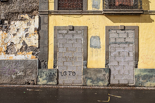 La Paz, Bolivia - August 31, 2014: Typical street in La Paz, Bolivia with colonial architecture in varying states of neglect.