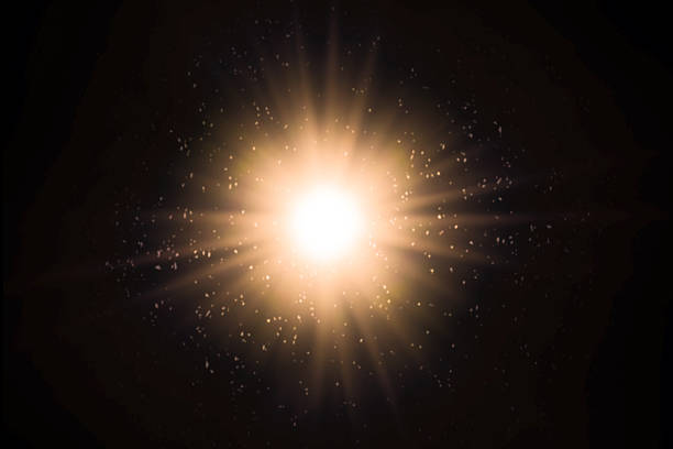 Abstract sun bursts, yellow glare on black background.light background.
