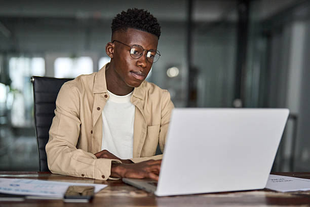 istock Busy African Black business man employee or student using laptop computer. 2256421211