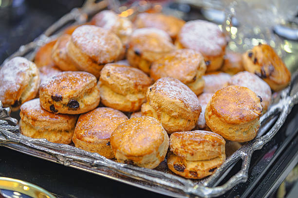 Delicious Homemade Cookies With Raisins and Walnuts on the  Baking Tray