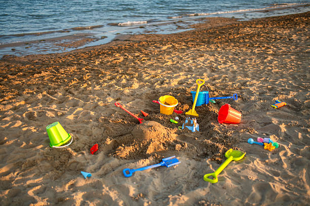 beach toy, plastic dozer toy, close-up. holiday
