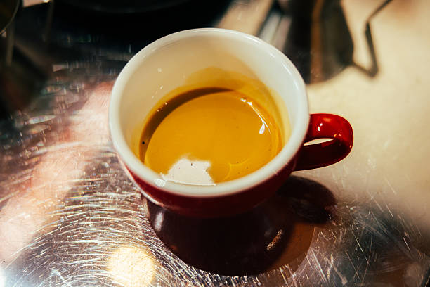 Fresh espresso in mug.