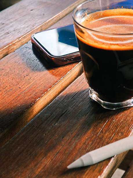 Coffee and Laptop in Warm Morning Light