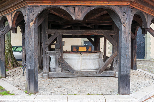 14th century Red Monastery, bell tower with sundial, wooden well, Slovakia