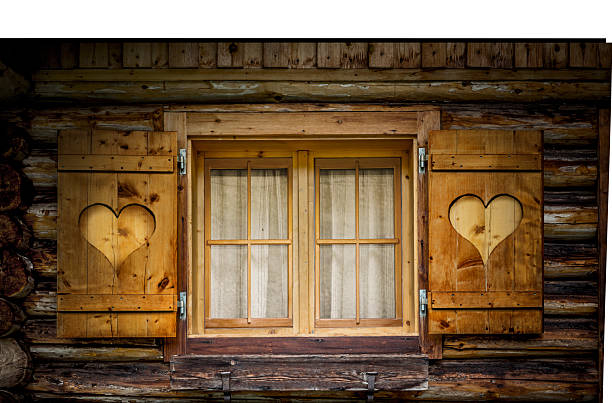Windows with shutters at an alpine alpine hut