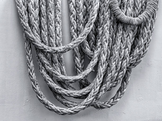 Weathered strong old ship rigging in multiple layers exhibiting power and strength from historical liberty ship in B&W