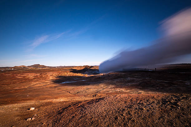 Icelandic landscape with steam of geothermal area