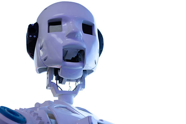 Horizontal portrait of a robot head close-up on a white background with empty space for inscription on the right. Humanoid artificial intelligence white metal body visible wires and circuitry