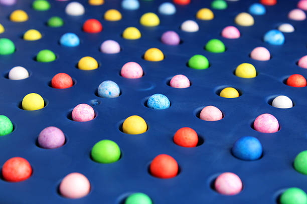 Colorful spheres placed in their positions and arranged in a row