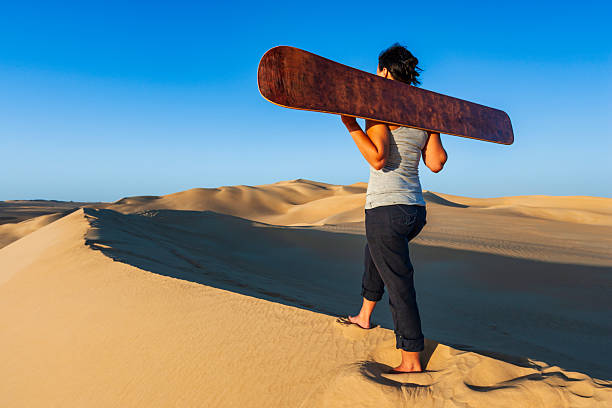 beauty portrait standing mid adult woman looking at the landscape in the valley of the moon in san pedro de atacama