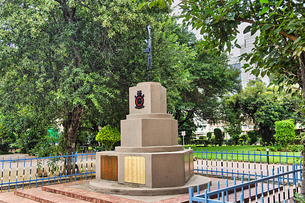 Gaborone, Botswana , 15 January 2026, Gaborone Center War Monument (BDF Memorial) in Gaborone, Botswana, featuring a rifle mounted on a plinth, surrounded by a garden and fence