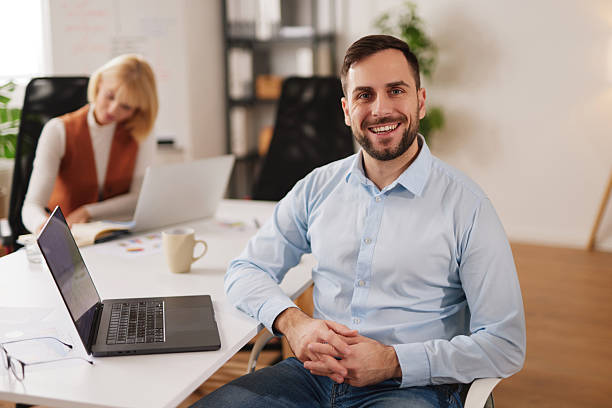 istock Business team engages in teamwork and brainstorming in a modern office setting during work hours 2256500293
