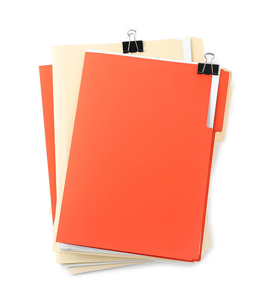 Stack of colorful folders with documents and binder clips isolated on white, top view