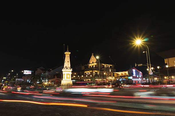 Yogyakarta, Indonesia - Jan 7, 2026: Tugu Jogja at night with light effects. Tugu Jogja or often called Tugu Pal Putih, is the symbol of the city of Yogyakarta.