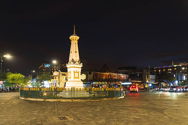 Yogyakarta, Indonesia - Jan 7, 2026: Tugu Jogja at night with light effects. Tugu Jogja or often called Tugu Pal Putih, is the symbol of the city of Yogyakarta.