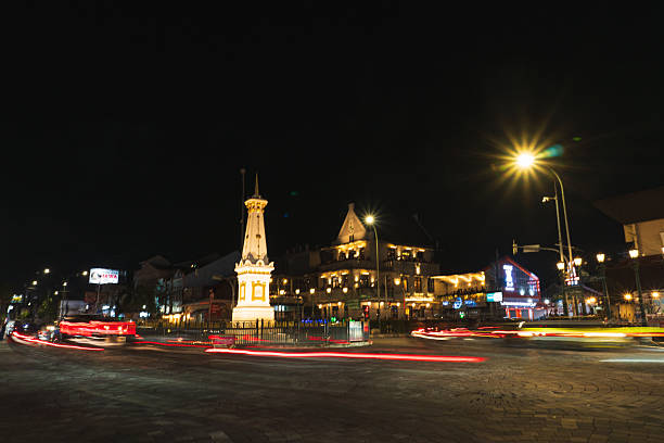 Yogyakarta, Indonesia - Jan 7, 2026: Tugu Jogja at night with light effects. Tugu Jogja or often called Tugu Pal Putih, is the symbol of the city of Yogyakarta.