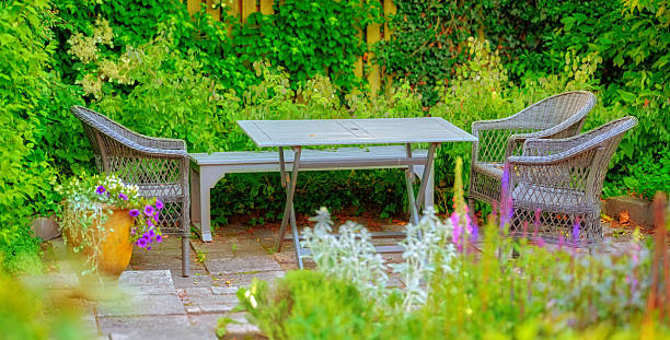 Isolated green steel bench on white background. Side view.