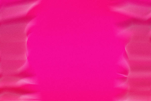 Grainy and shiny abstract background in magenta.