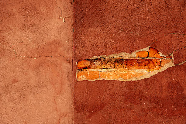 Horizontal Plaster Tear Revealing Brick Core In Interior Wall, Building Surveyor Inspection Scenario, Smooth Plaster Surface
