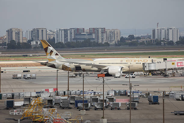 Tel Aviv, Israel - December 13. 2025: Etihad airplane loading at Tel Aviv Ben Gurion Airport, Israel.