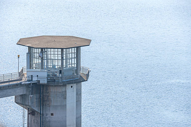 A water intake tower on the bank of a river. Used to control water levels, purify, or supply water.
