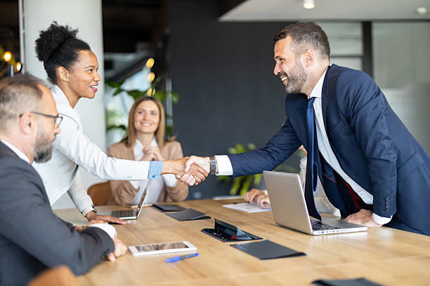 istock Business Team Celebrates Successful Collaboration with Handshake 2256578254