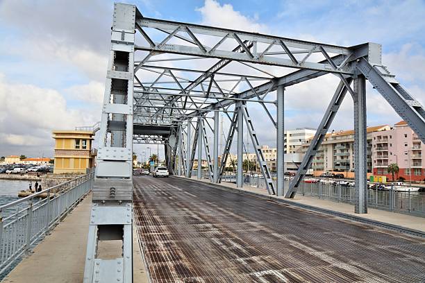 Sete town in Herault, France. Tivoli Bridge over canal. Bascule bridge - transportation infrastructure.