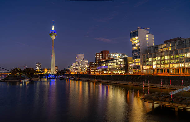 Media Harbour Duesseldorf at Night shining bright - Public Buildings. High quality photo