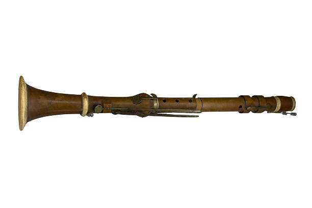 vintage musical instrument, old brown flute isolated on a white background