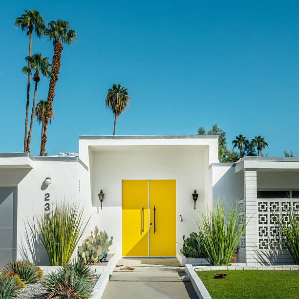 Modern mid-century architecture house with a colorful door in Palm Springs, California