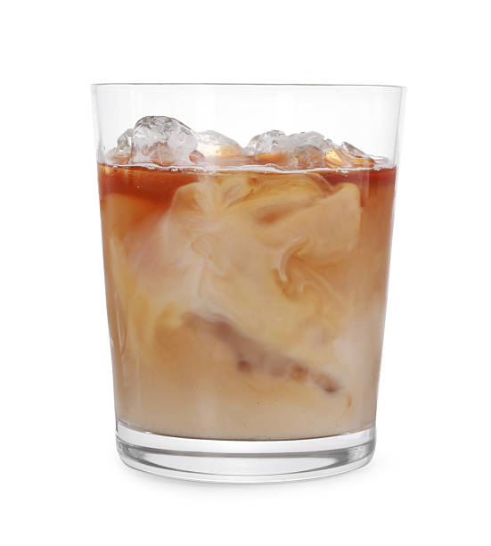 istock Glass of fresh iced coffee isolated on white 2256595825