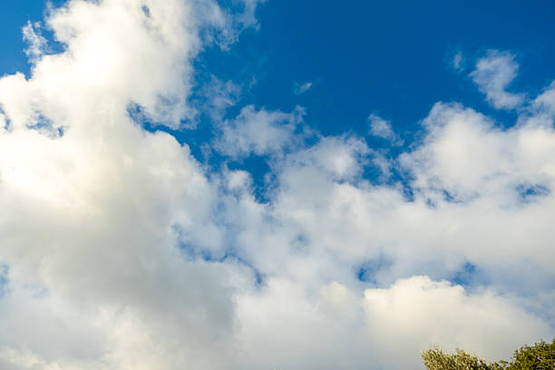 Wide angle majestic cloudscape showing natural weather patterns and a sense of freedom