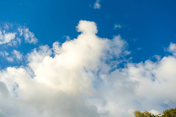 Wide angle majestic cloudscape showing natural weather patterns and a sense of freedom