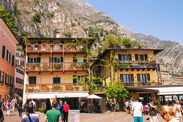 Limone sul Garda, Italy - August 15, 2025: Restaurant with visitors in Limone sul Garda on the shores of Lake Garda in Italy