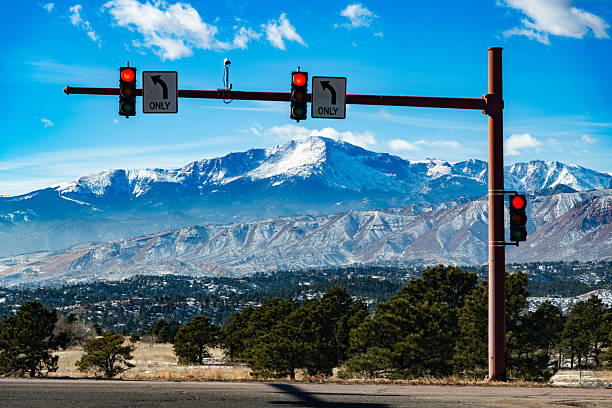 Snow capped Pike peak as seen from traffic light in Colorado Springs