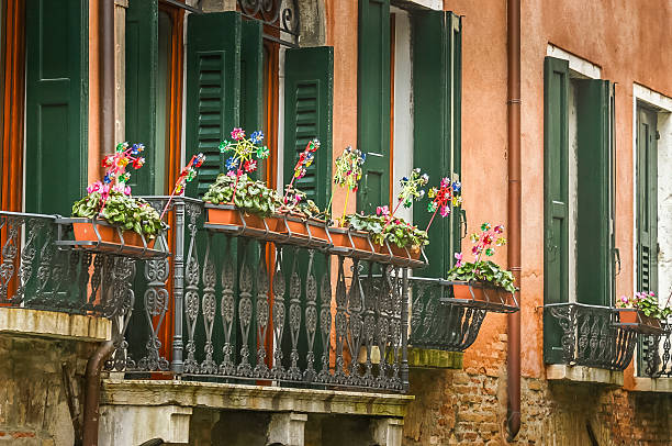 Classic Italian window with flowers