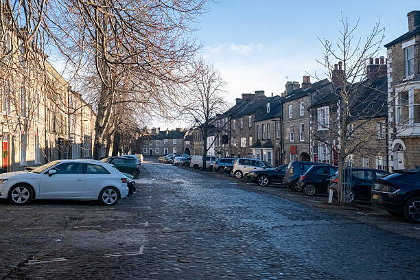 Newbiggin with parked cars in Richmond, a Georgian market town, on a winter's day