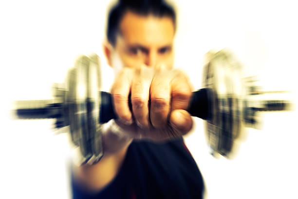 Gym equipment and sport concept.Strong and motion background.Dumbbells.
