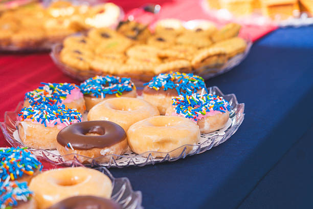 Berliner, carnival, donuts with paper streamers and confetti for carnival, holiday concept