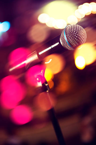 istock Microphone and stage lights.Concert and music concept 2256619958