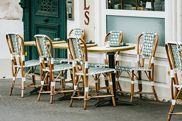 istock Outdoor Paris Cafe Tables and Wicker Chairs 2256621276