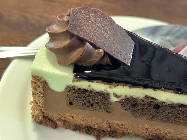 Sumptuous Chocolate Cake Slice With Mint Filling, Glossy Glaze