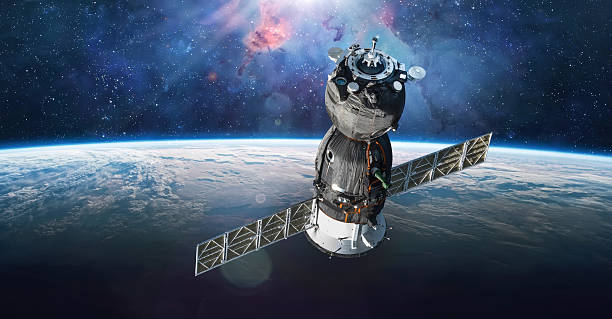 Cargo space ship on orbit of the Earth planet. Milky way on background. Spacecraft with astronauts in deep bright space. Galaxy and stars. Elements of this image furnished by NASA. Photo collage. Not AI (url: https://www.nasa.gov/wp-content/uploads/2021/12/blog_soyuzms20_docks_120821.jpg https://www.nasa.gov/wp-content/uploads/2024/09/iss071e649782.jpg?w=1024)